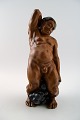 Bing & Grondahl 
Figurine of a 
man standing 
with grapes by 
Kai Nielsen.
Model number 
4025. From ...