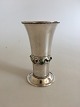 Georg Jensen 
830 Silver Vase 
No 132 in the 
Danish Art 
Noveau Style. 
Ornamented with 
Stones of ...