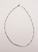 Silversmith Fl. 
Lund Copenhagen 
sterling silver 
necklace length 
45 cm. width 
0.2 cm. No. 
278153