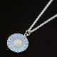 Bernhard Hertz. 
Marguerit / 
Daisy Pendant. 
Sterling Silver 
with blue 
enamel.
Chain 38 cm./ 
...