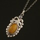C. F. Andreasen 
Silver Pendant 
witn Amber and 
Rock Crystal
Designed by C. 
F. Andreasen 
1893 - ...