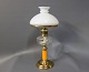 Kerosene table 
lamp with 
orange glass 
stem and brass 
foot from 
around the year 
1880.
H - 54 cm ...