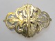 Belt buckle in 
silver-plated 
brass, England, 
c. 1900. 
Decorations in 
the form of 
foliage. ...