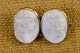 Cameo 2 
inverted head 
carved of white 
coral with rose 
dots and 
mounted in gilt 
frame. Jewelry 
is ...