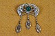 Brooch Art 
Nouveau, 
Jugendstil, Art 
Nouveau organic 
pattern in 
silver with 
closed back. 
...
