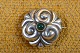 Brooch Art 
Nouveau silver 
decorated with 
green agate. 
Stamped 830S. 
Diameter 2 cm. 
Art No .: 36