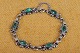 Bracelet art 
nouveau silver 
decorated with 
green glass 
stones. Str .: 
17 cm. Art No. 
40