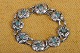 Bracelet art 
nouveau silver 
with closed 
back. Flowers 
made of in 
silver with 
center 
decoration ...