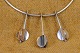 Neck ring in 
silver with 3 
silver pendant 
designed as 
beechnut on 
stems. Hallmark 
925 A. ...