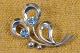 Brooch silver 
shaped as 
lieves and 
decorated with 
cubic zirconia 
in light blue. 
Stamped 
Sterling ...