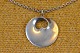 Silver Pendants 
Hidden Heart 
designed by 
Torun at George 
Jensen, incl. 
chain. Stamped 
825S Torun ...