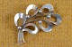 Brooch of 
silver, vintage 
design of the 
3-dimensional 
leaf pattern. 
Stamped 925S 
Denmark HS ...