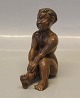 B&G Boy sitting 
10.5 x 8 cm Kai 
Nielsen Same 
style as the 
bachus figurine 
of the wine 
harvest - ...