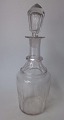 Cylindrical 
carafe in clear 
glass with 
grindings, 19th 
century. 
Denmark. With 
stopper with 
...