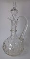 Glass decanter 
with cuttings. 
Stopper and 
handle. 
Denmark. 20th 
century. Height 
.: 33 ...