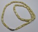 Greenland neck 
chain of bone, 
20th century. 
Length: 54 cm. 
Consisting of 
42 pieces.
Provenance ...