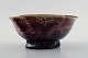 Scandinavian 
ceramist, art 
pottery bowl 
with purple 
glaze.
Signed 
illegible.
Measures: 14.5 
...