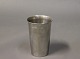Vase in tin by 
Just Andersen, 
numbered 247 
4B.
H - 13,5 cm 
and Dia - 9 cm.