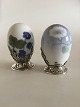 Pair of Royal 
Copenhagen Art 
Nouveau Eggs 
with A. 
Michelsen 
Stirling Silver 
Mounted Pieces. 
The ...
