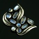 Carl 
Wedderkopp-
Jensen - 
Denmark. Silver 
Brooch with 
Moonstones
Designed and 
made by Carl 
...