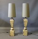 Tall tablelamps 
of painted 
metal with grey 
lamp shades. 
The lamps are  
from around the 
1960s. ...