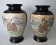 Pair Japanese 
Satsuma vases, 
19th century. 
With blue 
glaze. Scenes 
with men and 
women. ...