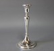 Candlestick 
with Pearl edge 
in 835 silver 
with green 
felt.
H - 24 cm and 
Dia - 11 cm.