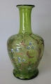 Carafe in green 
glass with 
enamel 
decoration, 
19th century. 
Germany. 
Height: 19 cm.