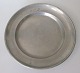 Pewter plate, 
1825, with city 
stamp and 
master mark. 
Dia: 21.4 cm. 
Stamped. On 
edge initials: 
...