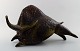 Very large 
Rörstrand / 
Rorstrand 
stoneware 
figure in 
Picasso style, 
bull on wooden 
stand.
In ...