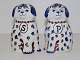 Royal 
Copenhagen 
earthenware 
figurines, dog 
salt- and 
pepper shaker.
Decoration 
number ...
