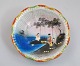 Japanese 
porcelain dish, 
20th century. 
Hand painted 
with women in 
nature. 
Stamped. Dia: 
23 cm.