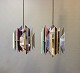 A pair of 
"Tivoli" 
pendants 
designed by 
Simon 
Henningsen in 
1962 and 
manufactured by 
LYFA in the ...