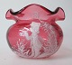 Vase in ruby 
??colored 
glass, 19th 
century. 
Germany. White 
enamel 
decoration of 
trumpet playing 
...