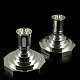 Georg Jensen A 
pair of  
Sterling Silver 
Candlesticks 
#691B - Harald 
Nielsen.
Designed in 
1933 ...