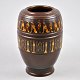 Cloisonne vase 
with Egyptian 
decorations. 
20th century. 
Brown. H: 24 
cm.