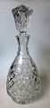 Crystal carafe 
with waffle 
grinding, 20th 
century. 
Germany. With 
stopper. 
Height: 30 cm.