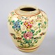 Japanese bojan. 
Faience. o. 
1900. Without 
lid. Polycrom 
decoration with 
flowers. 
Signed. H: 14 
...
