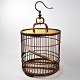 Chinese bird 
cage of bamboo 
and metal. 20 
thC. Height 
incl. 
Suspension 55 
cm., Dia .: 32 
cm.