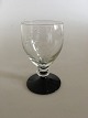 "Jane" 
Blackfooted 
White Wine 
Glass from 
Holmegaard with 
ingraved 
grapes. 10 cm 
H. Manufactured 
...