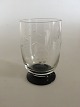 "Jane" 
Blackfooted 
Beer Glass / 
Tumbler with 
Grape 
ingravement. 
Holmegaard. 
10.5 cm H. ...