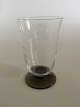 "Jane" Beer 
Glass with 
ingraved grapes 
from 
Holmegaard. 
Smoke to 
transparent 
foot, maybe 2nd 
...