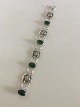 Georg Jensen 
Silver Bracelet 
No 12 with 
Green Agates. 
Made around 
1919 - 1927. 
Measures 19.5 
cm ...