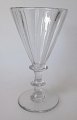 Wine glass, 
19th century 
Denmark. 
Holmegaard. The 
snerle type 
with pressed 
stripes. 
Height.: ...