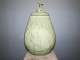 Extra large 
Royal 
Copenhagen art 
pottery lidded 
jar with 
celadon glaze.
It is 
decorated with 
...