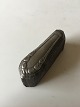 Georg Jensen 
Lily of the 
Valley 
paperweight in 
steel. A press 
for a knife 
handle.
Measures ...