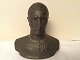 Bust in metal 
of King 
Christian d. 
10. Height 14.5 
cm width 13.5 
cm