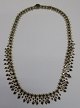 Beautiful gold 
plated necklace 
with numerous 
granates, 19th 
century L. 43.5 
cm.
Perfect 
condition!