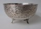 Silver bowl on 
three legs. 
20th C. 
Decorated on 
corpus with 
flower branch. 
Stamped. Dia .: 
8.8 ...