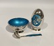 Salt shaker, 
saltbowl and 
saltspoon in 
925 sterling 
silver and 
light blue 
enamel by MEKA.
- ...